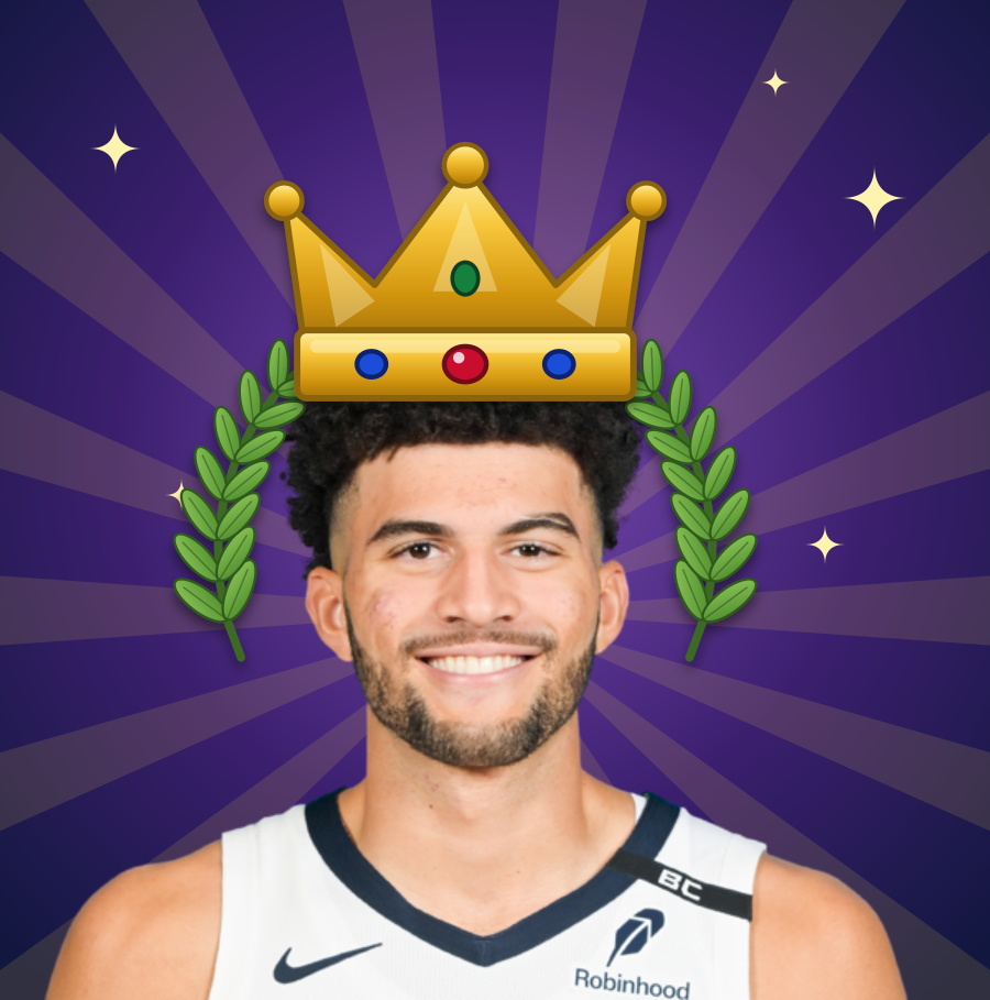Cam Boozer wearing a gold crown and laurel wreath